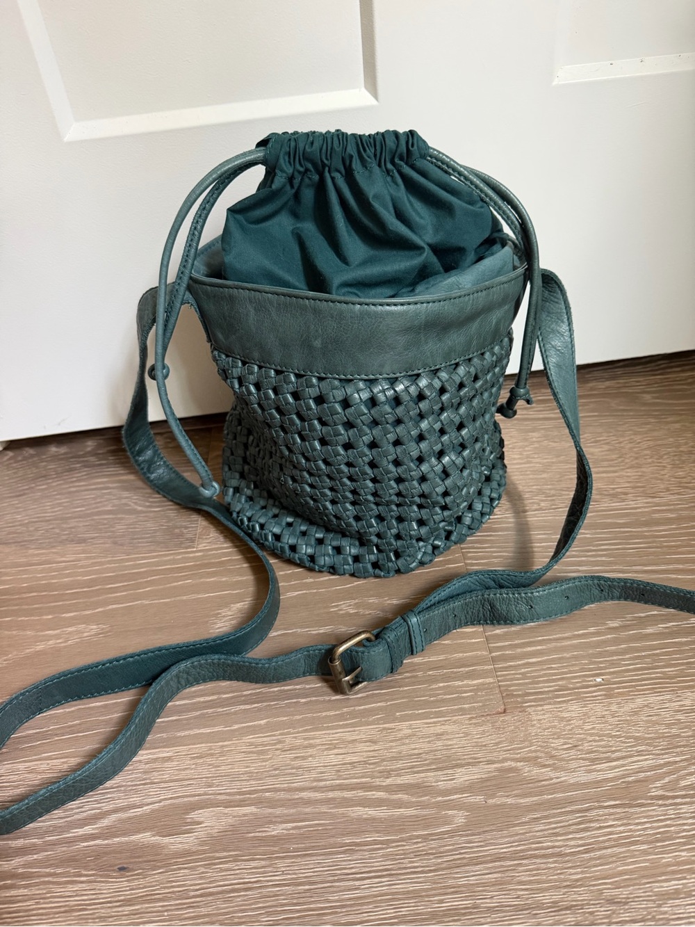 Woven leather Drawstring Crossbody Bag in Green